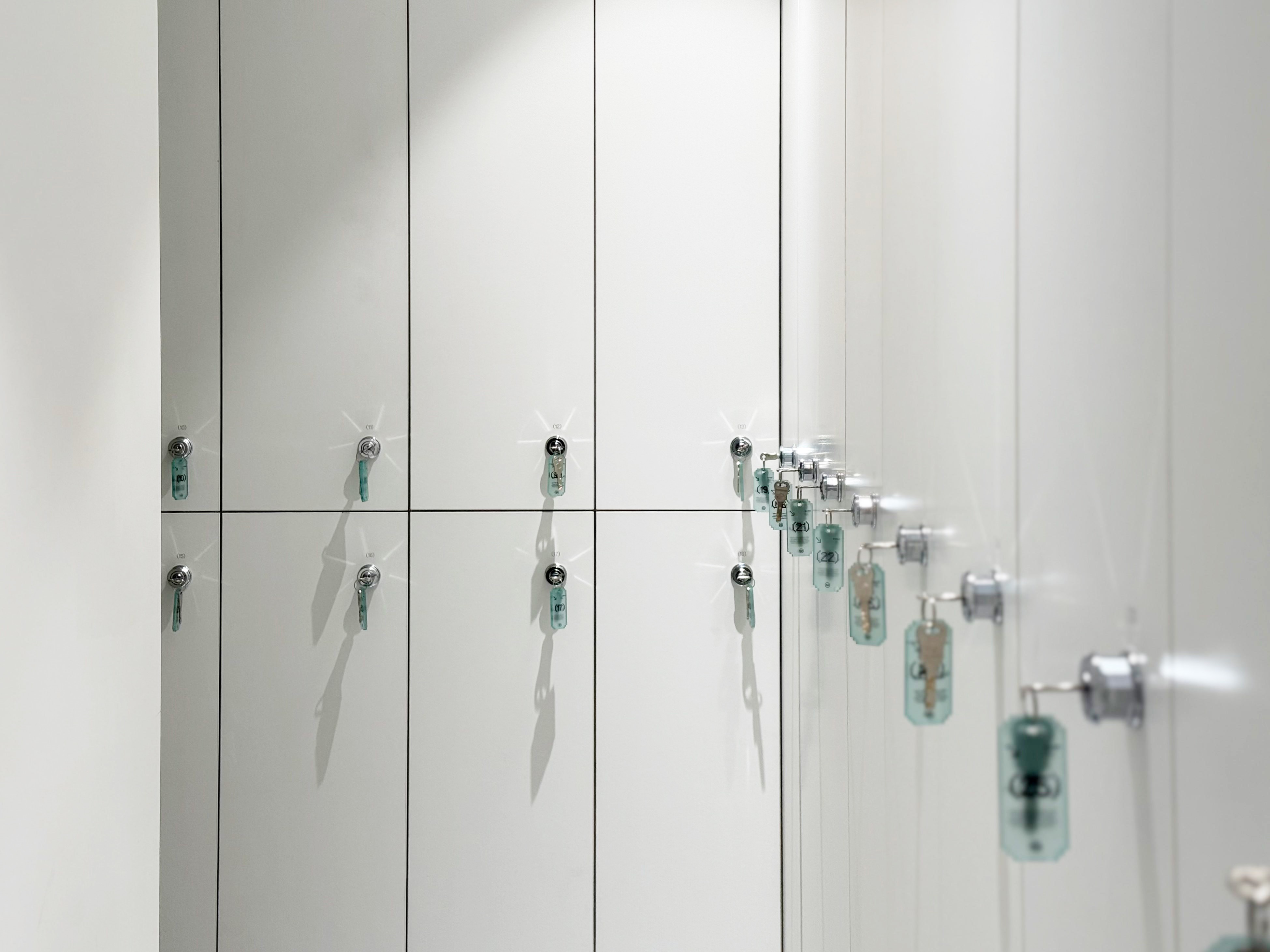 Anders brand wordmark in white placed on top of an image of a modern interior design.