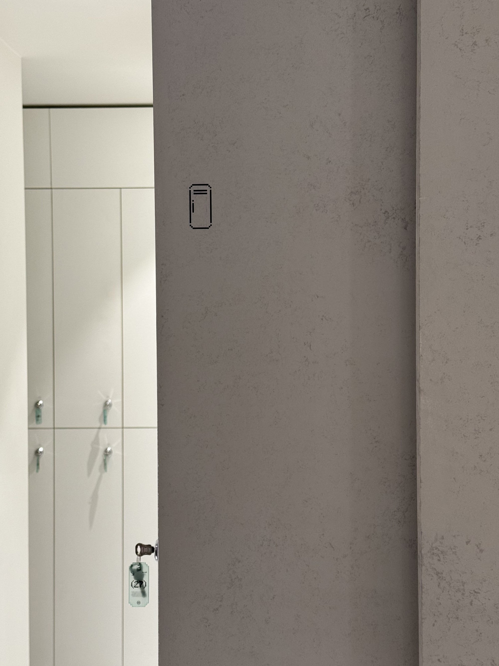 Graphic depicting a hexagonal cropped photo of an interior room design with grid lines along its borders.