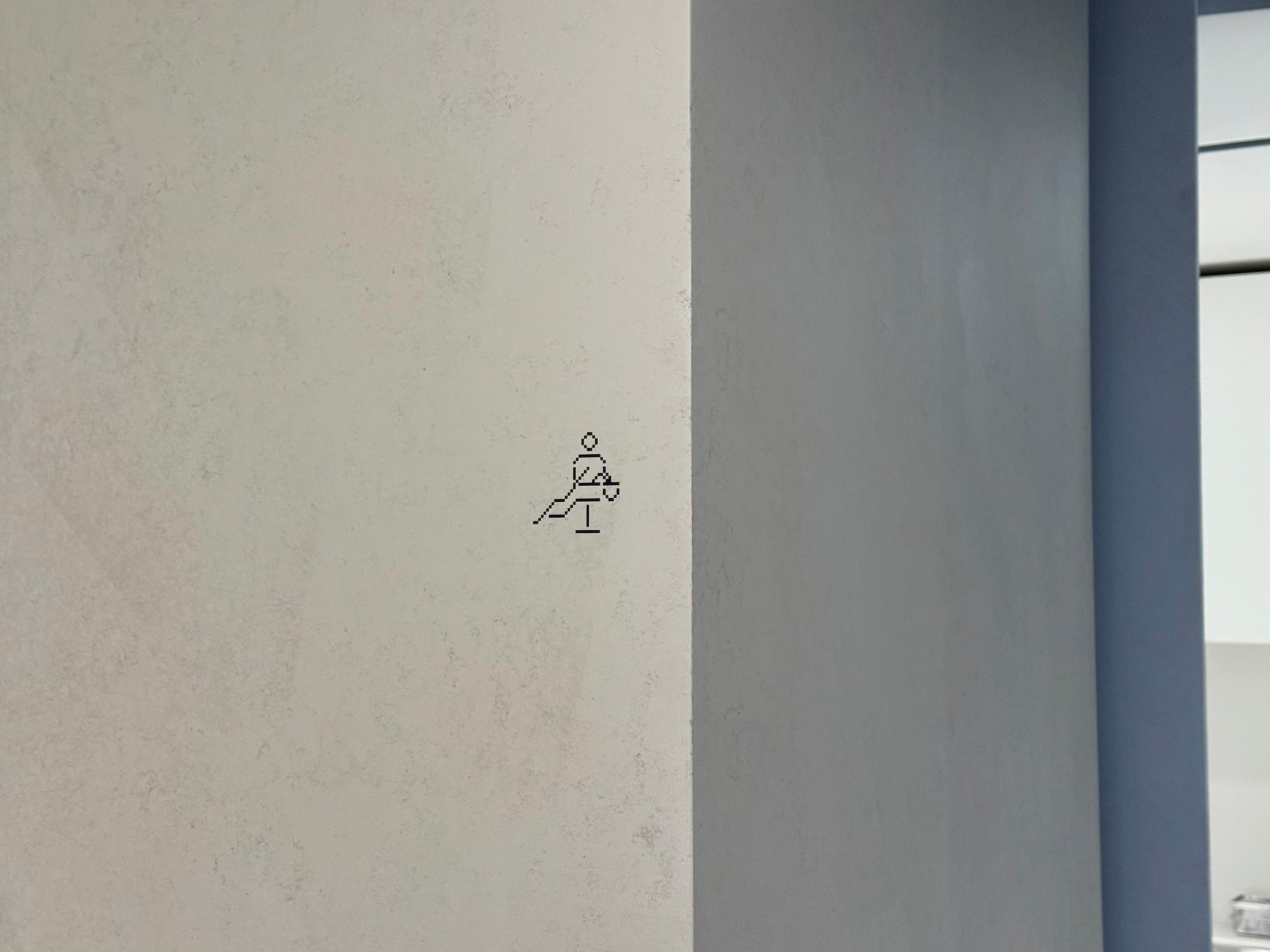 Anders brand wordmark in white placed on top of an image of a modern interior design.