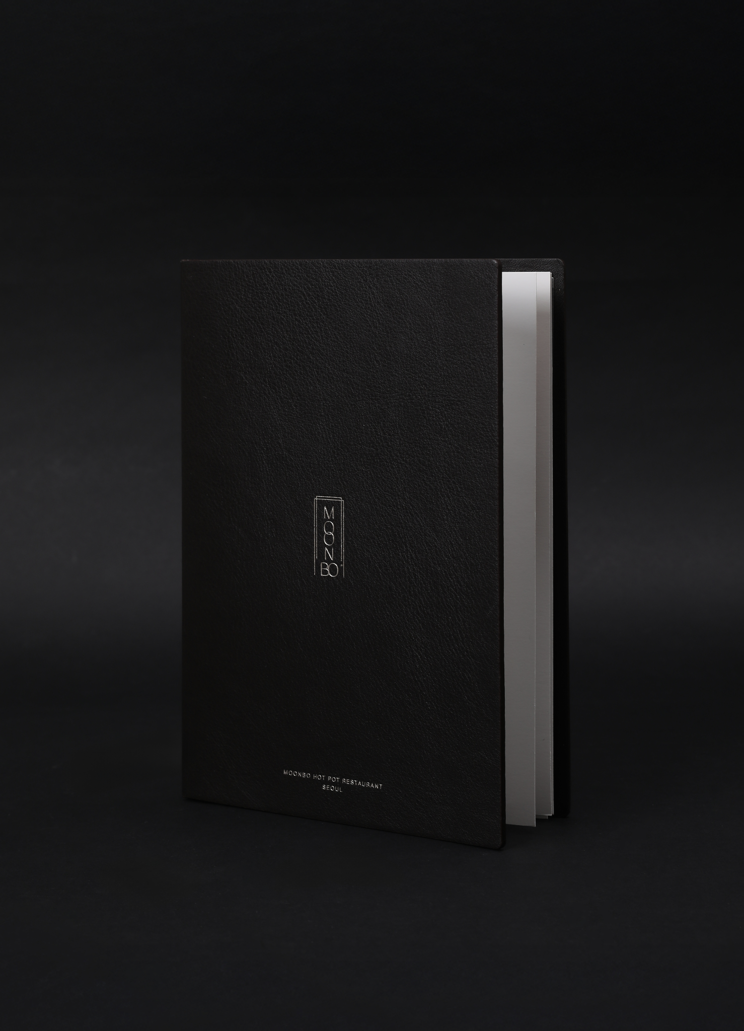 Graphic depicting a hexagonal cropped photo of an interior room design with grid lines along its borders.