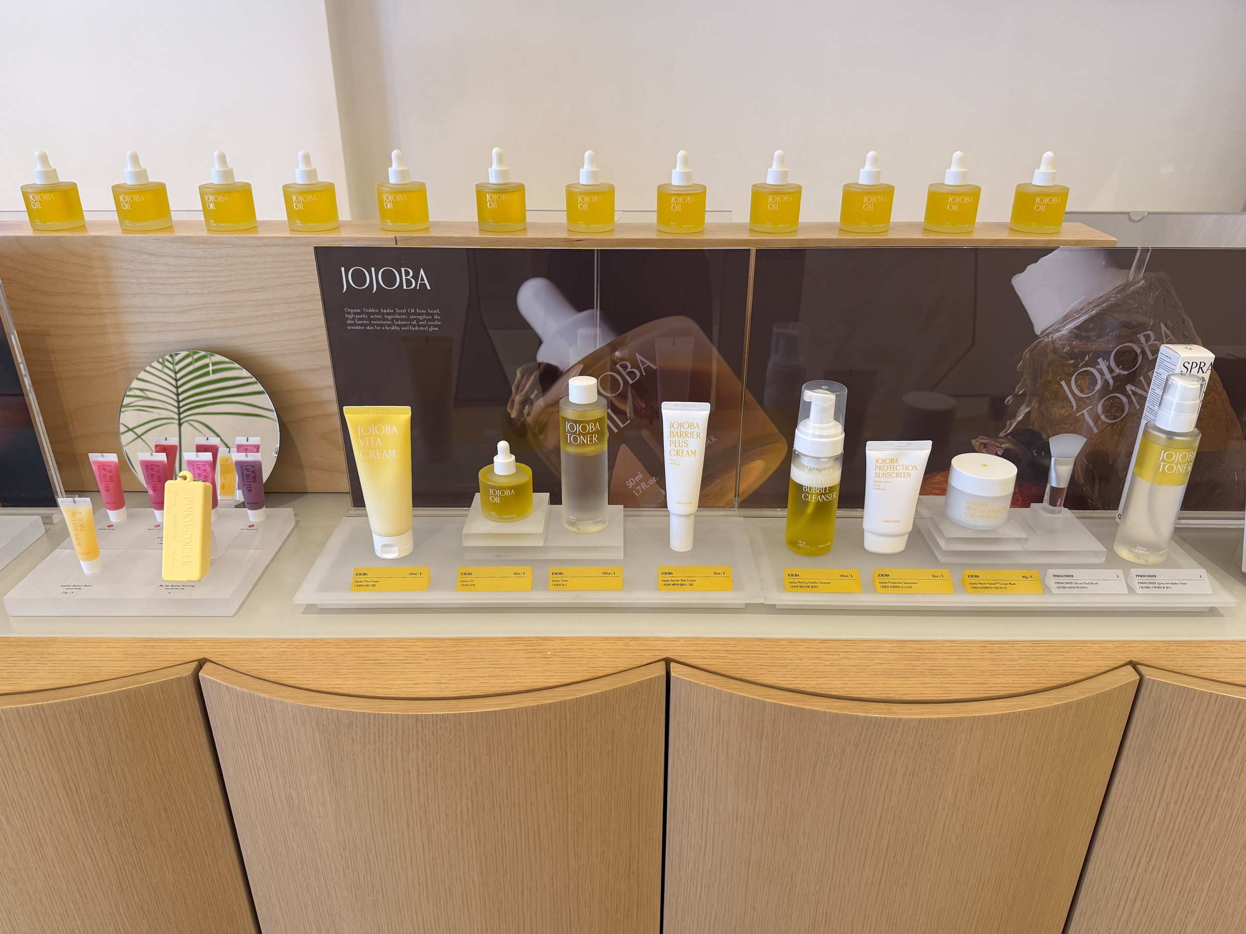 Graphic depicting UI-styled buttons with different categories of interior design items on top of an image of a modern interior living room.