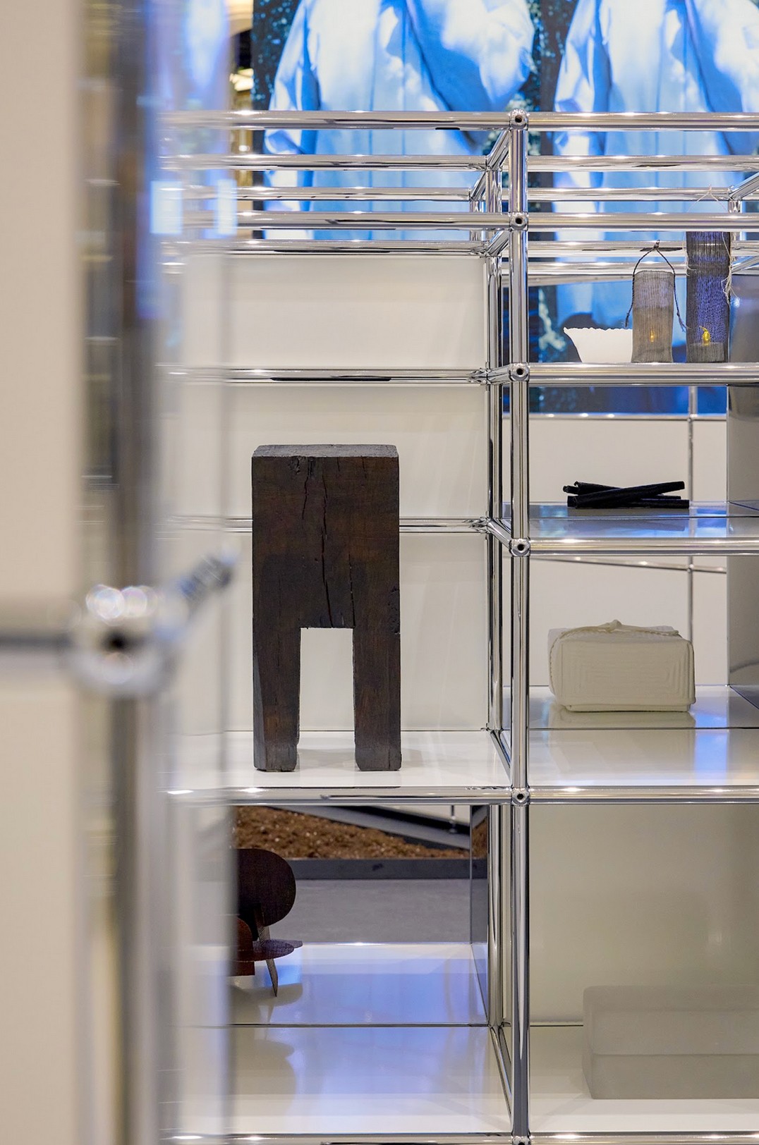 Graphic depicting a hexagonal cropped photo of an interior room design with grid lines along its borders.