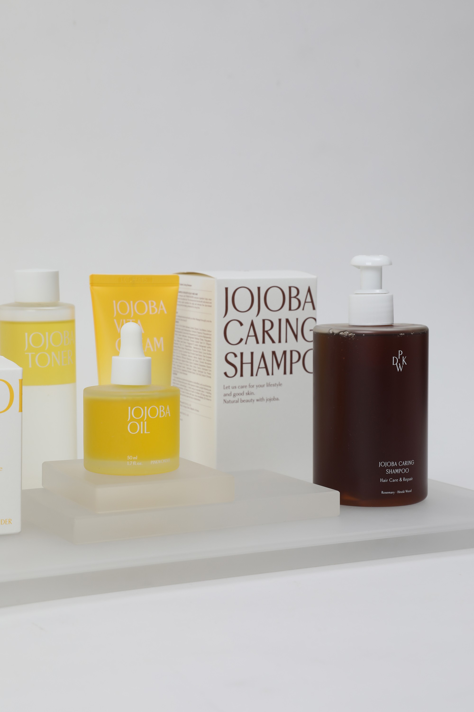 Graphic depicting a hexagonal cropped photo of an interior room design with grid lines along its borders.